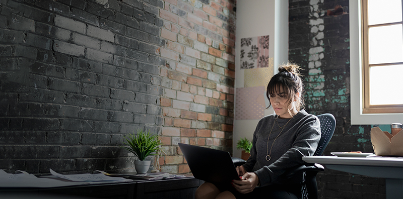 young woman using a laptop