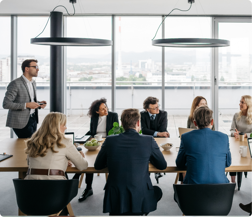 Business professionals in modern conference meeting room