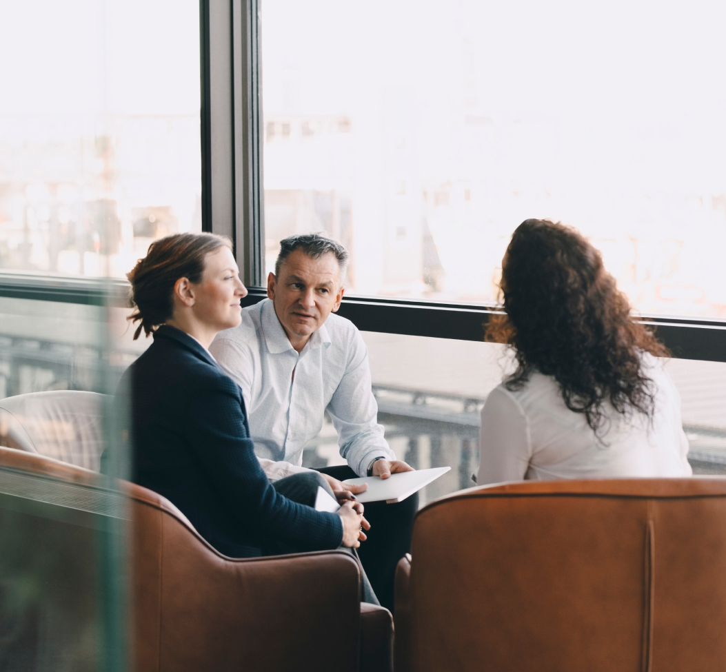 Business Meeting in Modern Office Lounge Area