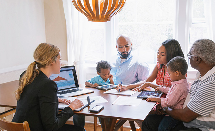 Family talking with advisor