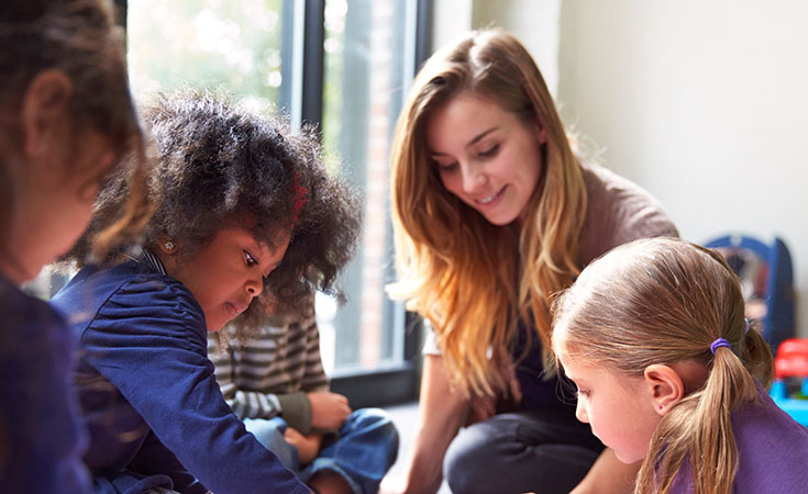 Teacher with children