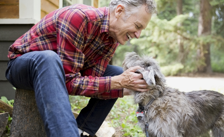 Man petting dog