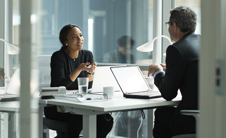 female advisor interviewing for equitable advisor position with male financial professional