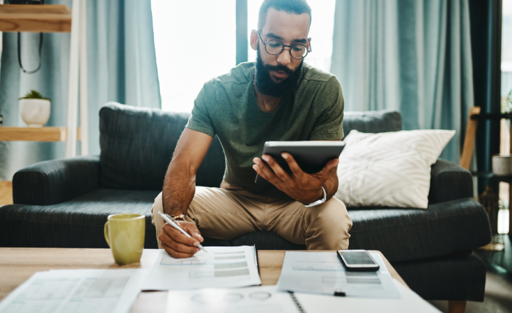 Man looking at tablet
