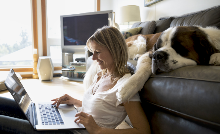 Woman looking at laptop